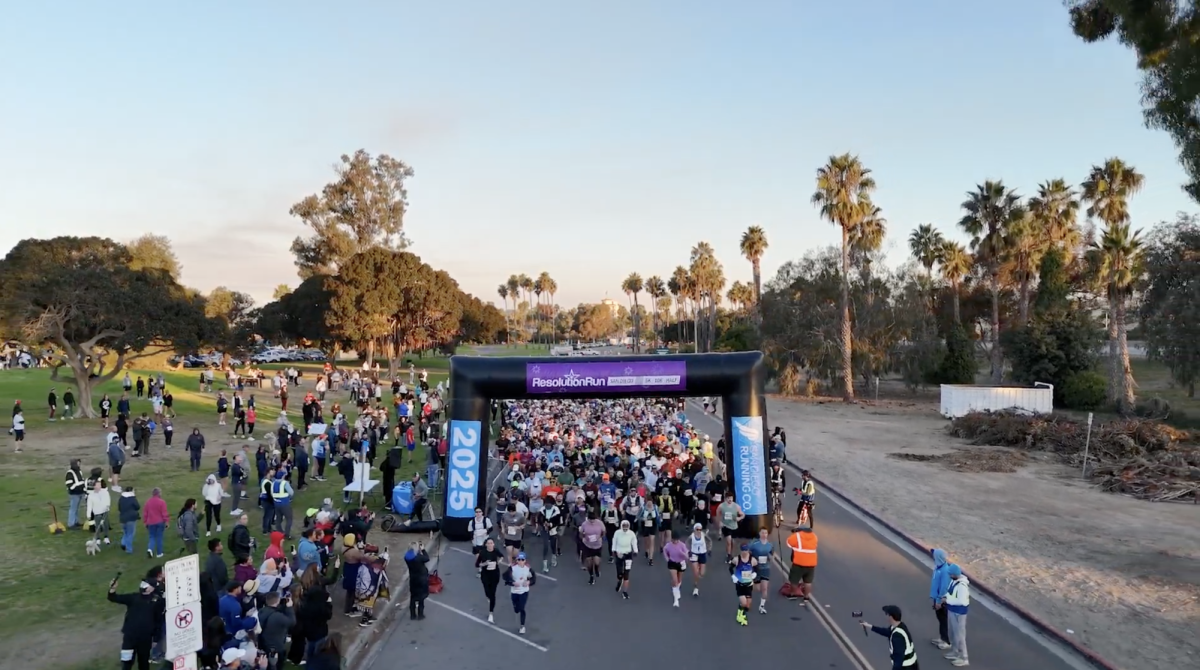 Runner's being the San Diego Resolution Run. Volunteers spoke about the importance of helping out at runs like this. Photo courtesty of Jaycee Mack. 